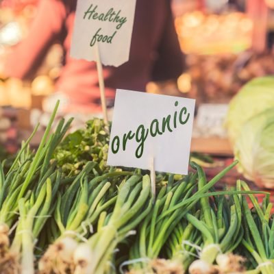 Organic foods. Fresh organic food at the local farmers market. Farmers markets are a traditional way of selling agricultural products.