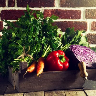 Food Vegetable Colorful Background. Tasty Fresh Vegetables in Wooden Box on Wooden Table. Kitchen Background. Copy Space. Toning.